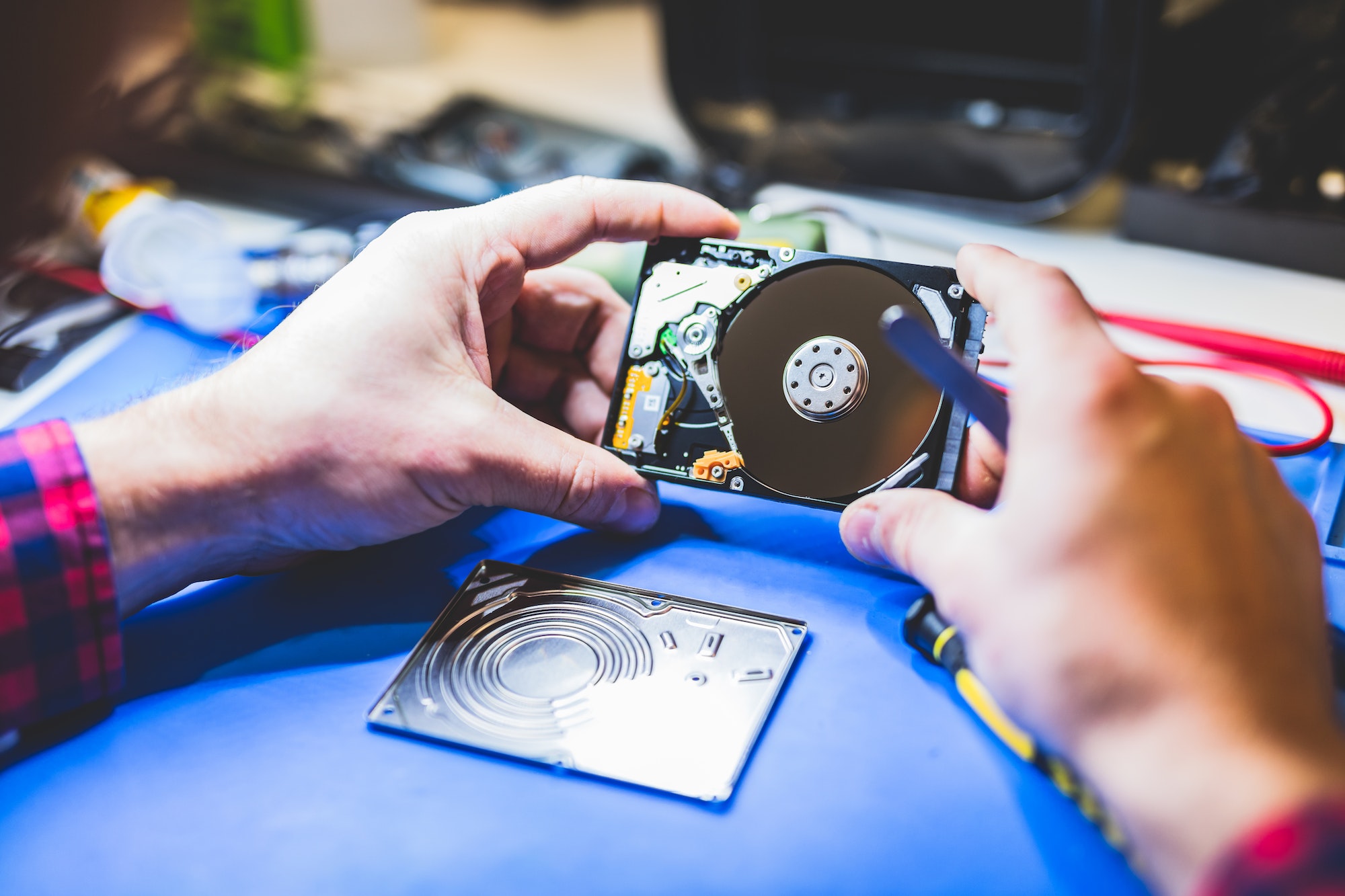 Man holding a hard disc.
